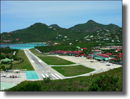 Airport in St. Barthelemy (St. Barts, St. Barth), travel gear, luggage, swimsuit, swimwear 